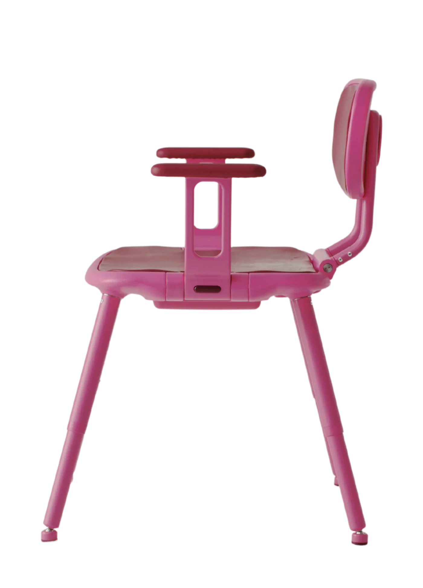 Right side view: Opposite side profile of the pink shower chair, showing the backrest, padded seat, armrest and height-adjustable legs.