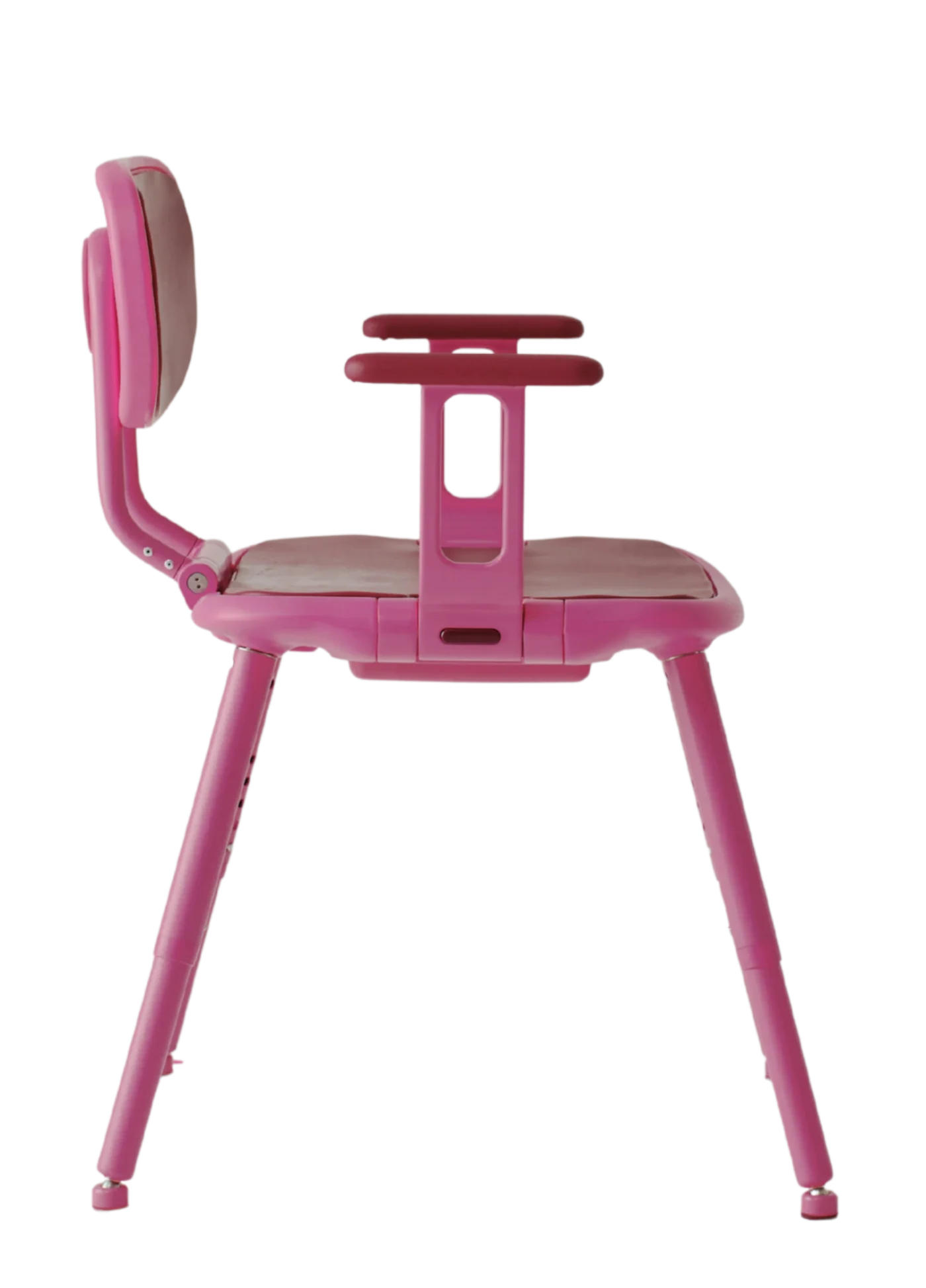 Left side view: Side profile of a pink shower chair showing the padded seat, upright backrest, armrest and height-adjustable legs.